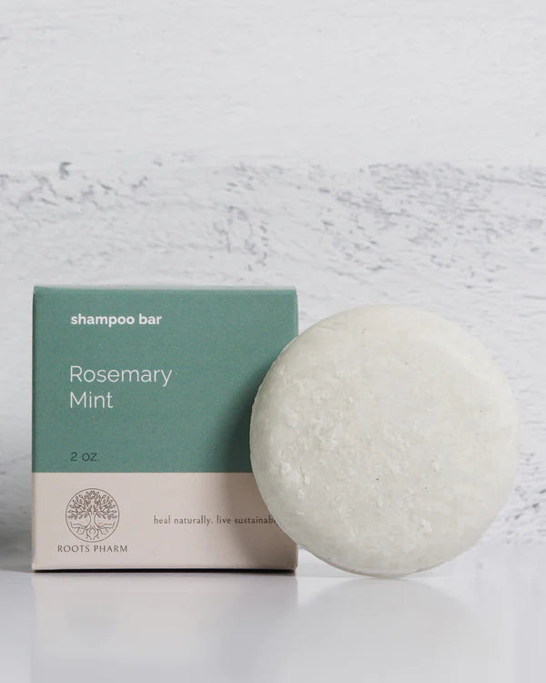 photo of roots pharm's rosemary mint shampoo bar for hair growth and volume on a white background